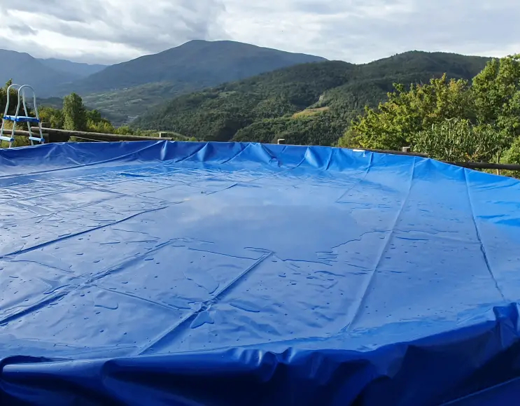 BÂCHE DE PISCINE RONDE EN PVC 400 GR/M2 AVEC ŒILLETS